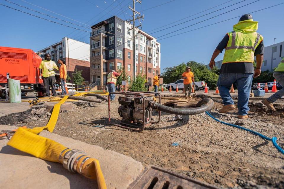 File image from July 19, 2022 as workers with Charlotte Water fixed a broken water main on Central Avenue near Lamar Avenue in Plaza Midwood. The area is again closed due to a new issue. Arthur H. Trickett-Wile/atrickett-wile@charlotteobserver