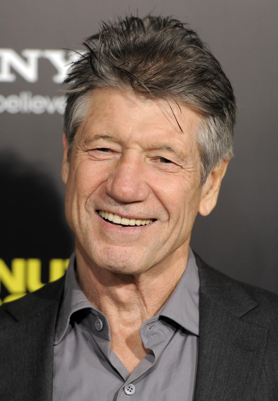 FILE - Fred Ward, a cast member in "30 Minutes or Less," poses at the premiere of the film in Los Angeles on Aug. 8, 2011. Ward, a veteran actor who brought a gruff tenderness to tough-guy roles in such films as “The Right Stuff,” “The Player” and “Tremors,” died Sunday, May 8, his publicist Ron Hofmann said Friday, May 13, 2022. He was 79. (AP Photo/Chris Pizzello, File)