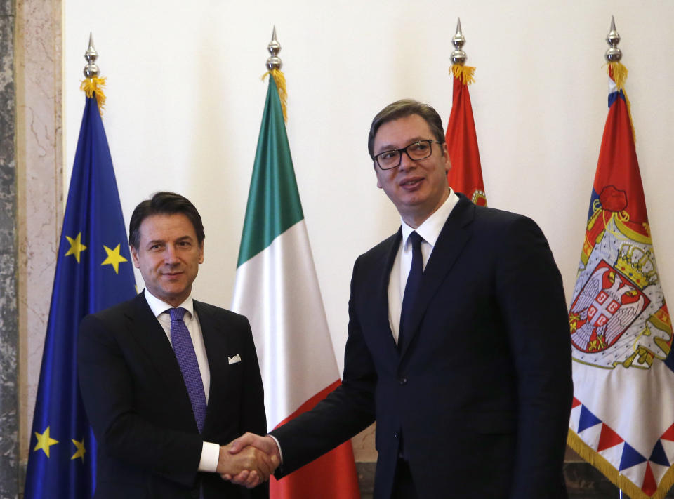 Italian Prime Minister Giuseppe Conte, left, shakes hands with Serbian President Aleksandar Vucic in Belgrade, Serbia, Wednesday, March 6, 2019. Conte is on a one-day official visit to Serbia. (AP Photo/Darko Vojinovic)