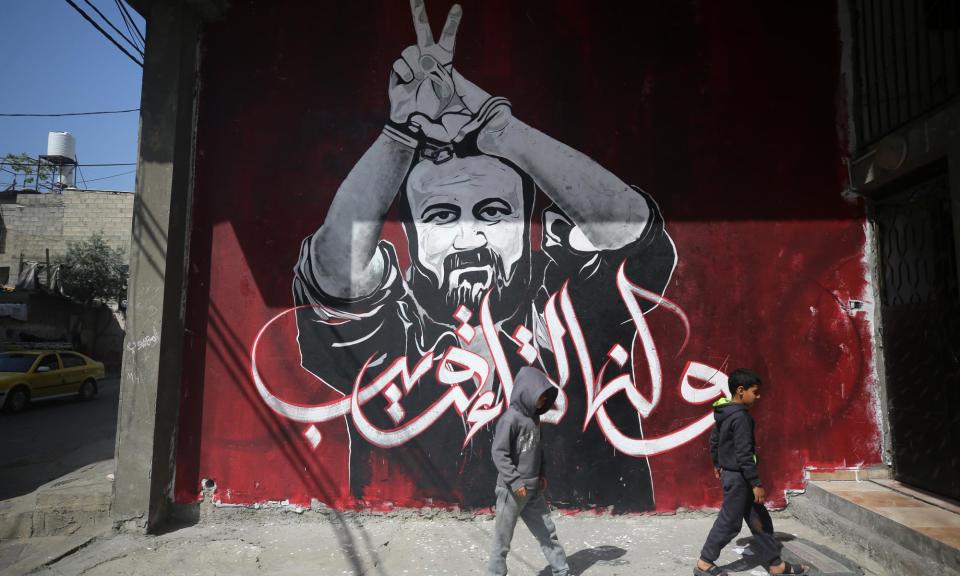 <span>A mural shows the jailed Fatah leader Marwan Barghouti, in Jabalia refugee camp in the northern Gaza Strip in April 2023.</span><span>Photograph: NurPhoto/Getty Images</span>