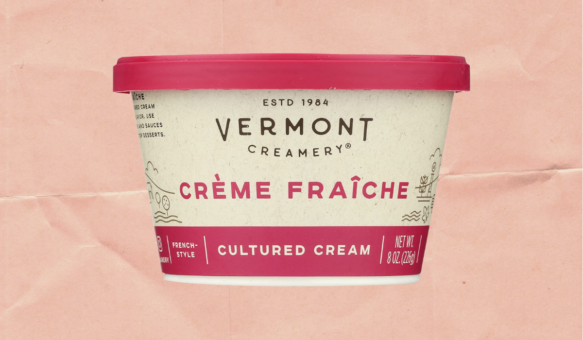 A tub of Vermont Creamery Creme Fraiche with a pink lid