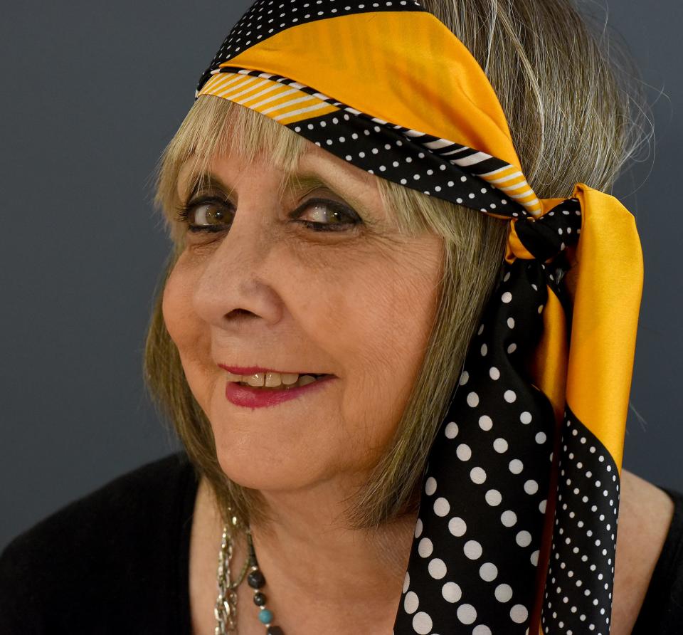 Lilly Butler, Class of 1965 from Monroe High School, dressed in the era of Woodstock for the prom on June 3 at the Mable H. Kehres apartments in Monroe. She protested the Vietnam War but then joined the Navy in 1973. "You could call me a 'wild child,'" she said.