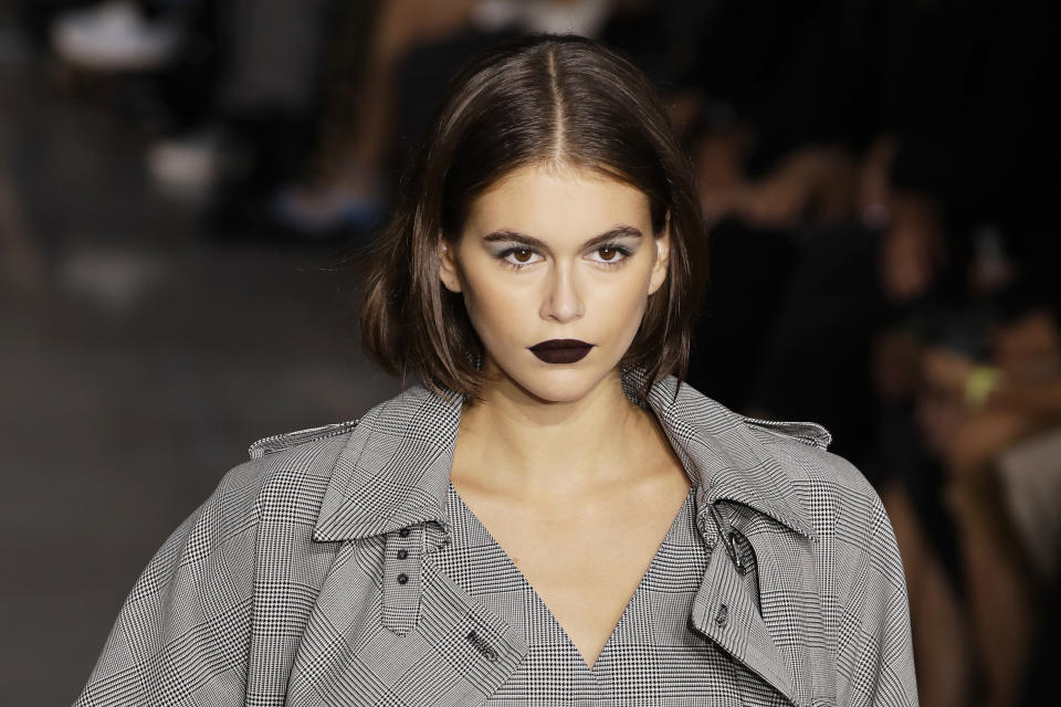 Model Kaia Gerber wears a creation as part of the Max Mara Spring-Summer 2020 collection, unveiled during the fashion week, in Milan, Italy, Thursday, Sept. 19, 2019. (AP Photo/Luca Bruno)