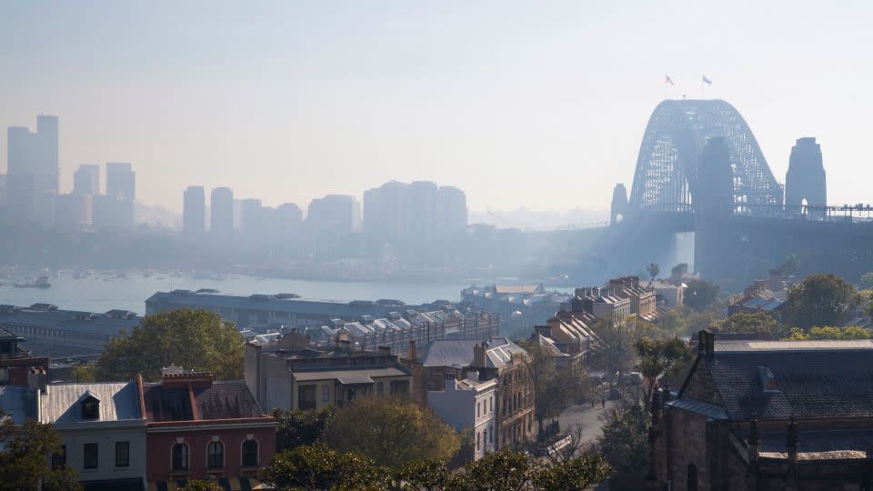 Sydney Harbour Bridge shrouded by smoke on September 13, 2023, after controlled blazes burned on the city's fringes in preparation for the looming bushfire season. - Steve Christo/AFP/Getty Images