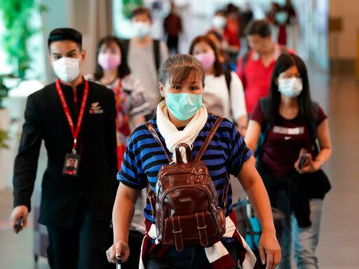 ▲馬來西亞衛生部宣布將於27日該國進一步放鬆新冠防疫措施的標準操作程序。（圖／美聯社／達志影像）