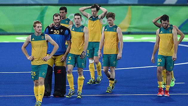 The Australian men's hockey team was dumped out of the Games after going down 4-0 to the Netherlands in the quarter-finals.