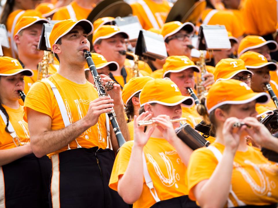 The Pride of the Southland band wears T-shirts made with a bullied child's design for Tennessee's home game against Chattanooga at Neyland Stadium in Knoxville on Saturday.