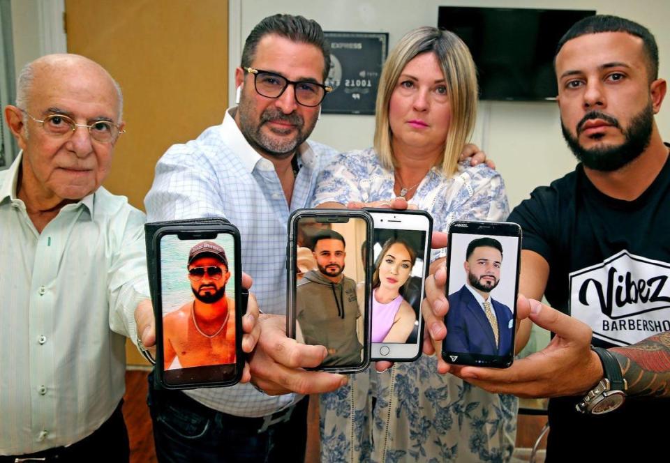 Javier Perez’s father Juan Perez, brother Luis Perez and brother Jorge Perez with Carolyn Alvarez’s mother Liz Alvarez, all hold their phones with pictures of Carolyn and Javier, August 6, 2020. Javier Perez, a boat passenger was killed in the Bahamas along with his girlfriend Carolyn Alvarez. The family is lashing out at the boat captain, who they say left Perez and Alvarez to die in the waters off the islands.