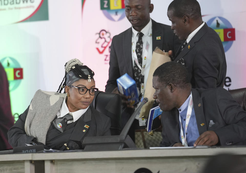 Zimbabwe Electoral Commission Chairperson Priscilla Makanyara Chigumba prepares to announce the presidential election results in Harare, Zimbabwe, on Saturday, Aug. 26, 2023. Chigumba declared President Emmerson Mnangagwa the winner. (AP Photo/Tsvangirayi Mukwazhi)