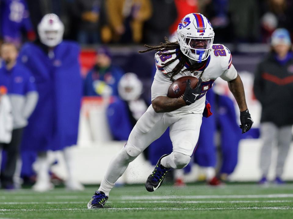 James Cook runs with the ball for the Buffalo Bills.