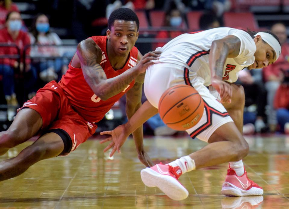 Bradley's Terry Roberts, left, and ISU's Howard Fleming Jr. eye a loose ball late in the second half Sunday, Jan. 16, 2022 at Redbird Arena in Normal. The Redbirds defeated the Braves 74-65.