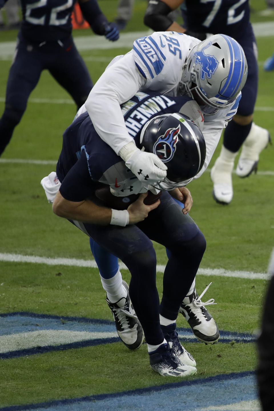 Detroit Lions defensive end Romeo Okwara sacks Tennessee Titans quarterback Ryan Tannehill for a safety during the first half of an NFL football game Sunday, Dec. 20, 2020, in Nashville, N.C. (AP Photo/Ben Margot)
