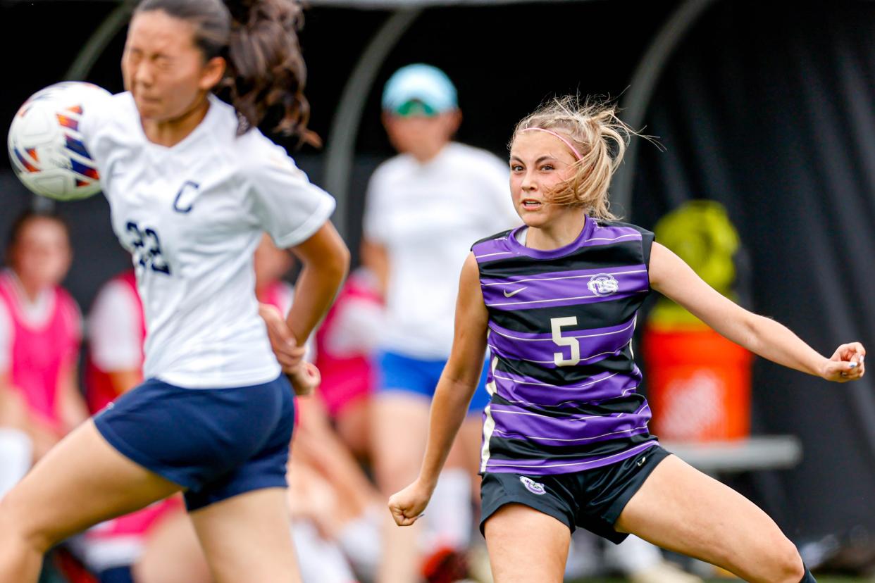 Community Christian’s Tomie Crawford (5) kicks toward goal during the Class 3A girls state championship soccer game between Community Christian and Casady in Oklahoma City, on Saturday, May 11, 2024.