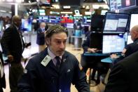 Traders work on the floor of the New York Stock Exchange (NYSE) in New York