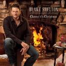 6. Blake Shelton, Cheers, It's Christmas - Blake, you're a funny, handsome, talented man, and everyone loves you. But were you born in a barn, man? Don't just sit there posing when there's snow coming through the door and piling up on the living room floor! Stop preening like a J. Crew model and get a dadblasted shovel before the tree shorts out, dude.