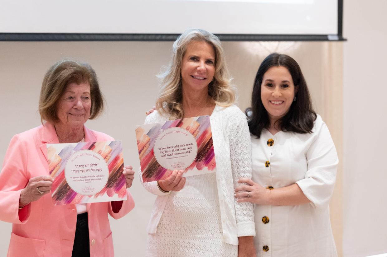 Doreen Bilezekian, left, and Dawn Iseson, center, with Chabad House Palm Beach program director Hindel Levitin, took part in a bat mitzvah milestone celebration April 8 at The Colony Hotel.