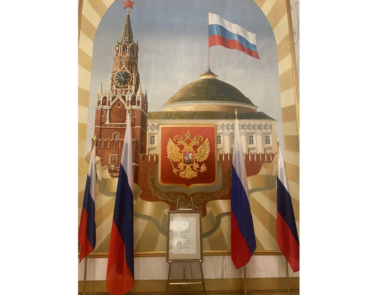 A mural depicting Russian symbols in the embassy during the party.