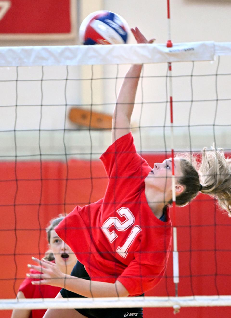 Molly Fredo of Barnstable spikes the ball back at Old Rochester in Wednesday's  scrimmage.
