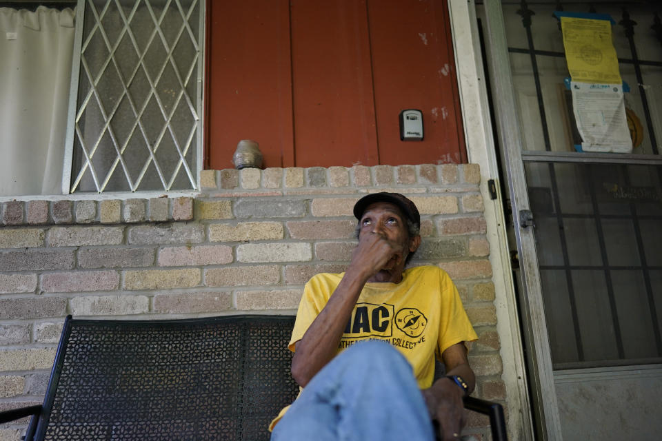 Mal Moses talks about the damage done to his home by Hurricane Harvey in 2017 and the difficulties he faced to get repairs, Thursday, Aug. 25, 2022, in Houston. A local nonprofit, West Street Recovery, ultimately helped repair his home. (AP Photo/David J. Phillip)