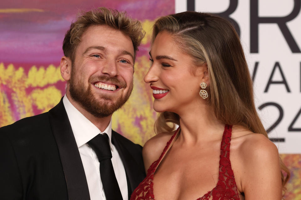 Sam Thompson and Zara McDermott look loved up at the Brits