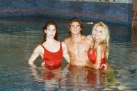 <p>Alexandra Paul, David Charvet, and Pamela Anderson pose for a <em>Baywatch</em> photo call in London in 1993. </p>