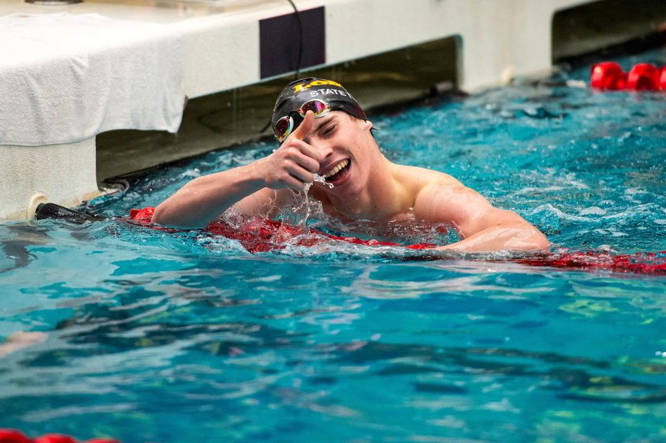 Rocky Mountain's Sam Lofstrom gives a thumbs up to the crowd after finishing his event during the Class 5A state swimming championships on Saturday, May 11, 2024 at the Veterans Memorial Aquatics Center in Thornton, Colo.