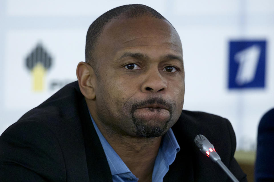 FILE - In this Oct. 28, 2015, file photo, Roy Jones Jr. attends a news conference after picking up his Russian passport in Moscow. Jones and Mike Tyson are older, wiser, calmer men than the superstars who dominated their sport. Their fight at Staples Center on Saturday night, Nov. 28, is an eight-round exhibition bout with no official judging and limited violence, although the limit depends on whether you're asking the fighters or the California State Athletic Commission. For Tyson and Jones, this unique pay-per-view boxing match is less of a sporting event and more of a chance for two transcendent athletes to prove age is a number and aging is a choice. (AP Photo/Ivan Sekretarev, File)