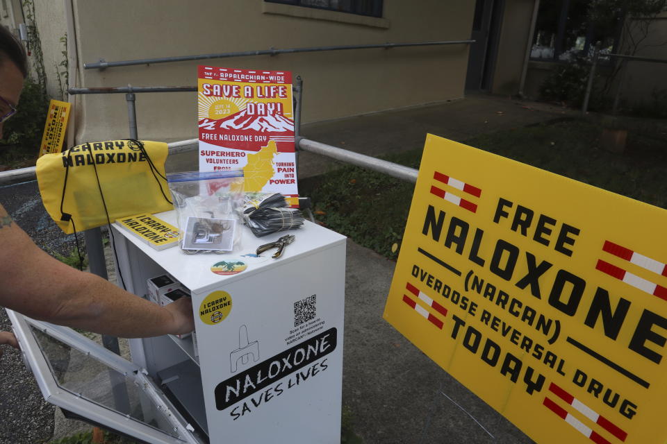 Nonprofit Solutions Oriented Addiction Response West Virginia co-founder Sarah Stone prepares items for the first ever Appalachian Save a Life Day naloxone distribution event on Monday, Sept. 11, 2023, at the Unitarian Universalist Congregation of Charleston in Charleston, W.Va. (AP Photo/Leah Willingham)