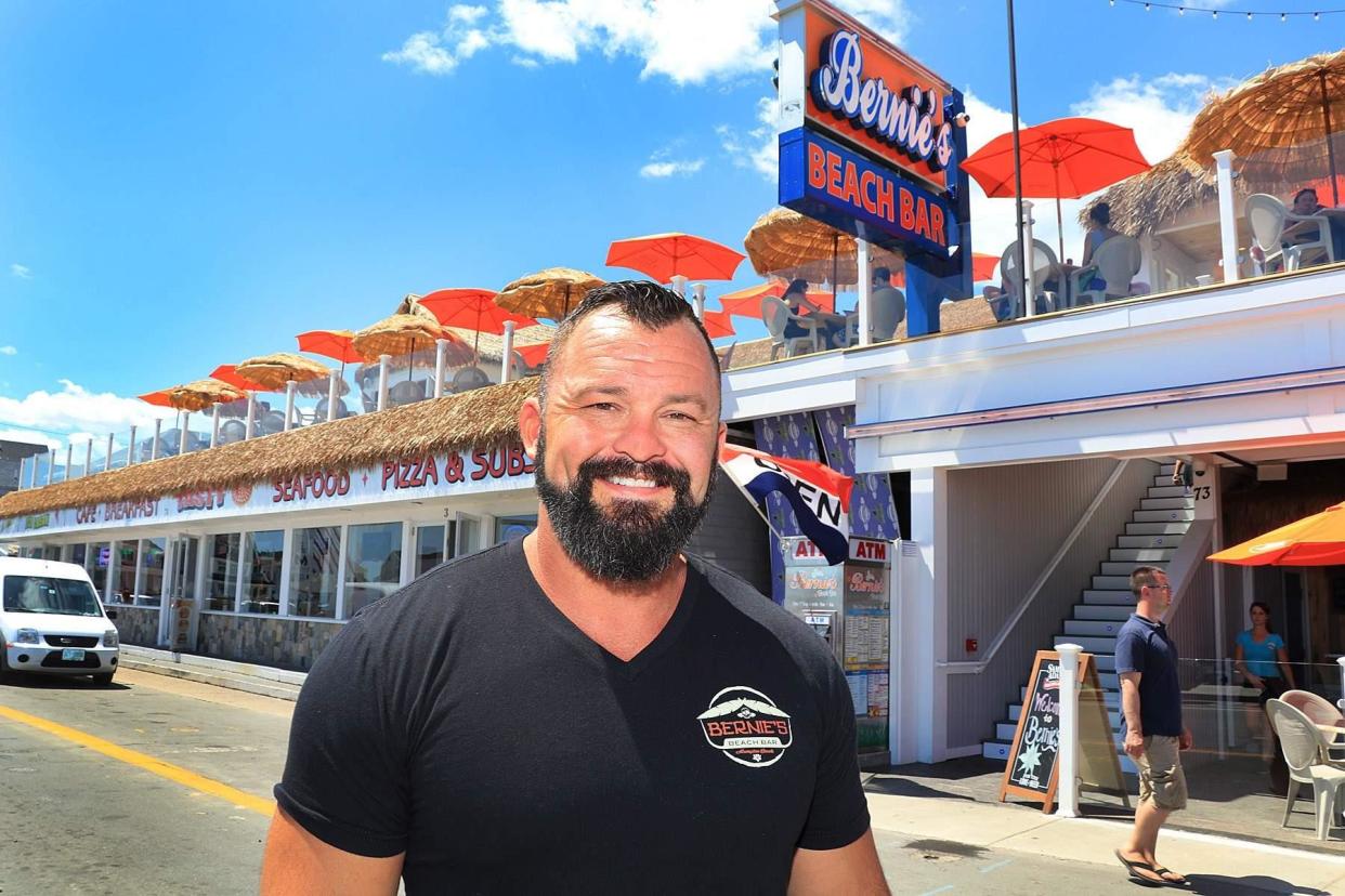 Hampton Beach entrepreneur Al Fleury has plans this summer for new streetside seating underneath his second-floor outdoor deck at Bernie’s Beach Bar.