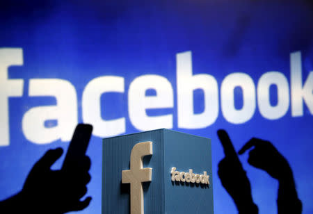 FILE PHOTO - A 3D plastic representation of the Facebook logo is seen in this illustration photo May 13, 2015. REUTERS/Dado Ruvic/Illustration/File Photo