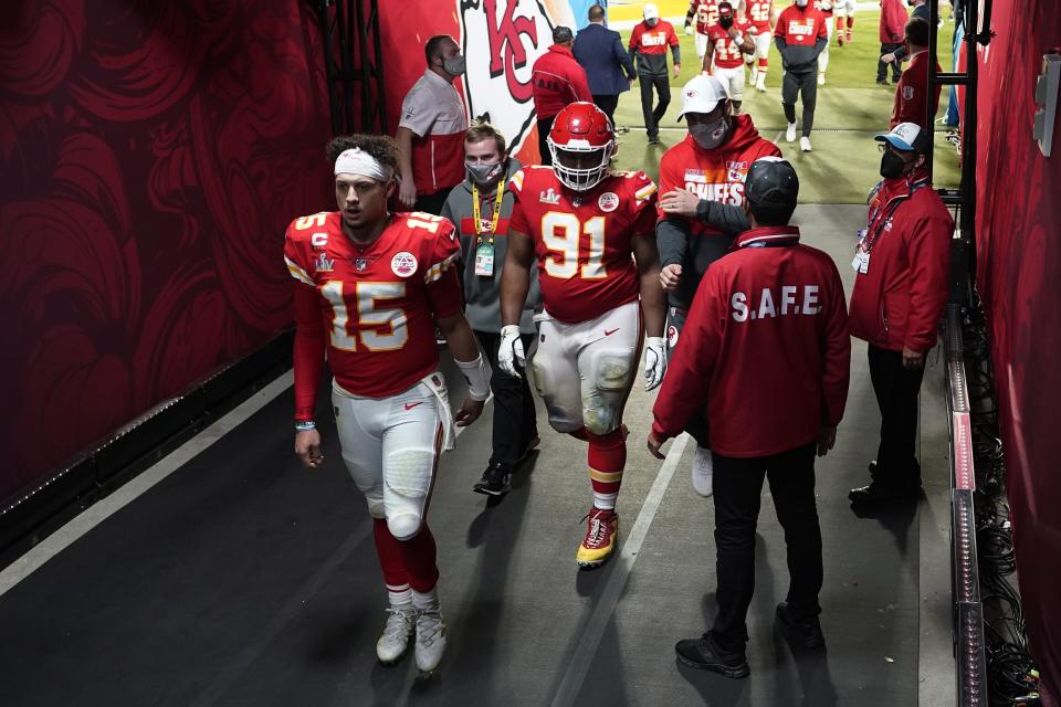 Kansas City Chiefs quarterback Patrick Mahomes (15) walks to the locker room following NFL Super Bowl 55 football game against the Tampa Bay Buccaneers Sunday, Feb. 7, 2021, in Tampa, Fla. The Buccaneers defeated the Chiefs 31-9 to win the Super Bowl. (AP Photo/David J. Phillip)