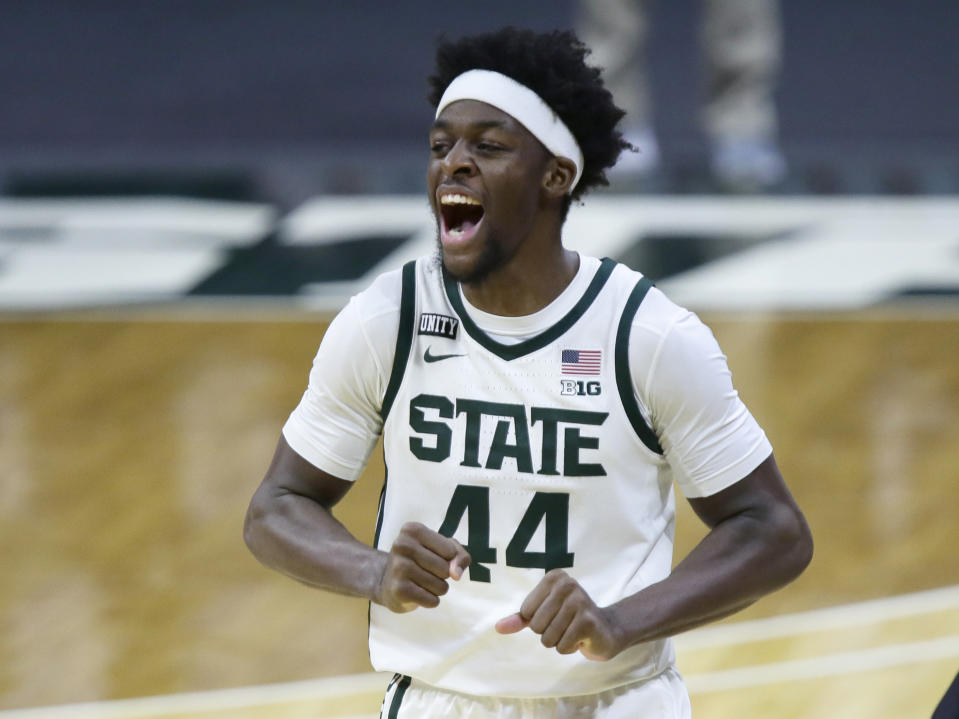 Michigan State forward Gabe Brown celebrates the team's 71-67 win over Ohio State in an NCAA college basketball game Thursday, Feb. 25, 2021, in East Lansing, Mich. (AP Photo/Duane Burleson)