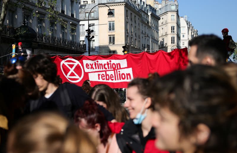 Extinction Rebellion activists hold protest in Paris, urging presidential candidates to act on climate change