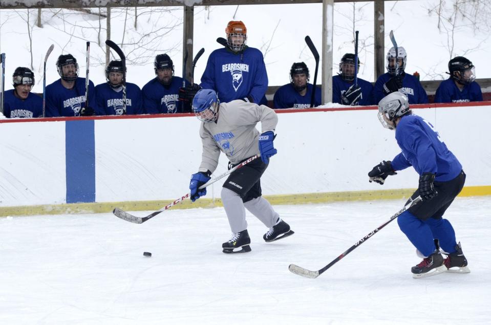Players take part in a Char-Em C. League hockey game at the Winter Sports Park in Petoskey.