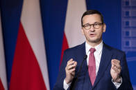 FILE - In this Sept. 17, 2020 file photo, Poland's Prime Minister Mateusz Morawiecki speaks during a news conference following joint meetings of the government of the Lithuania and the government of the Poland at the Palace of the Grand Dukes of Lithuania in Vilnius, Lithuania. An official with Poland's conservative governing party said Friday, Sept. 18, 2020, that the the country's right-wing coalition government has collapsed. (AP Photo/Mindaugas Kulbis, file)