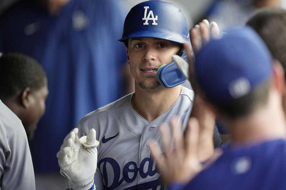 Los Angeles Dodgers' Kiké Hernández celebrates his home run in the ninth inning of a baseball game against the Cleveland Guardians, Thursday, Aug. 24, 2023, in Cleveland. (AP Photo/Sue Ogrocki)