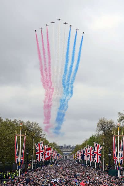 PHOTO: The Royal Air Force Aerobatic Team otherwise known as The Red Arrows fly over The Queen Victoria Memorial during the Coronation of King Charles III and Queen Camilla, May 06, 2023 in London. (Dan Mullan/Getty Images)