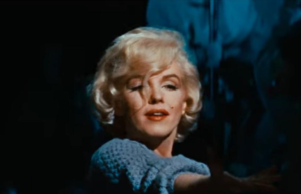 Marilyn Monroe sings during a scene in "Let's Make Love"