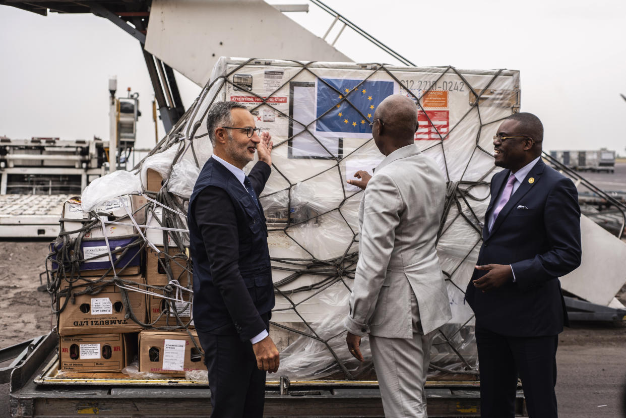 FILE - Officials check Mpox vaccine MVA-BN vaccine, manufactured by the Danish company Bavarian Nordic, at the airport in Kinshasa, Congo, Sept. 5, 2024. (AP Photo/Samy Ntumba Shambuyi, File)