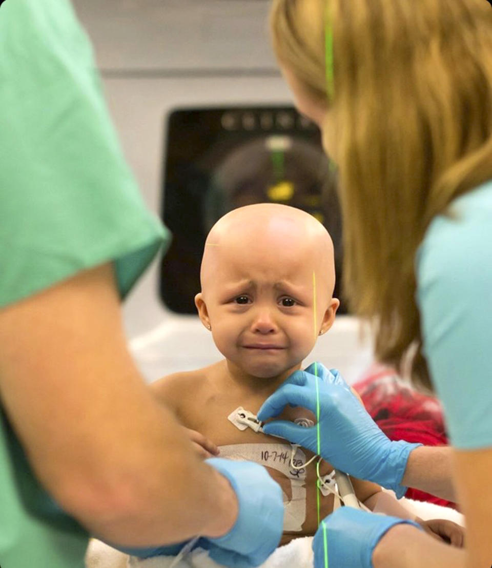 Pictured is Sophia Soto having a lead put on her chest as part of her cancer treatment. Source: Caters