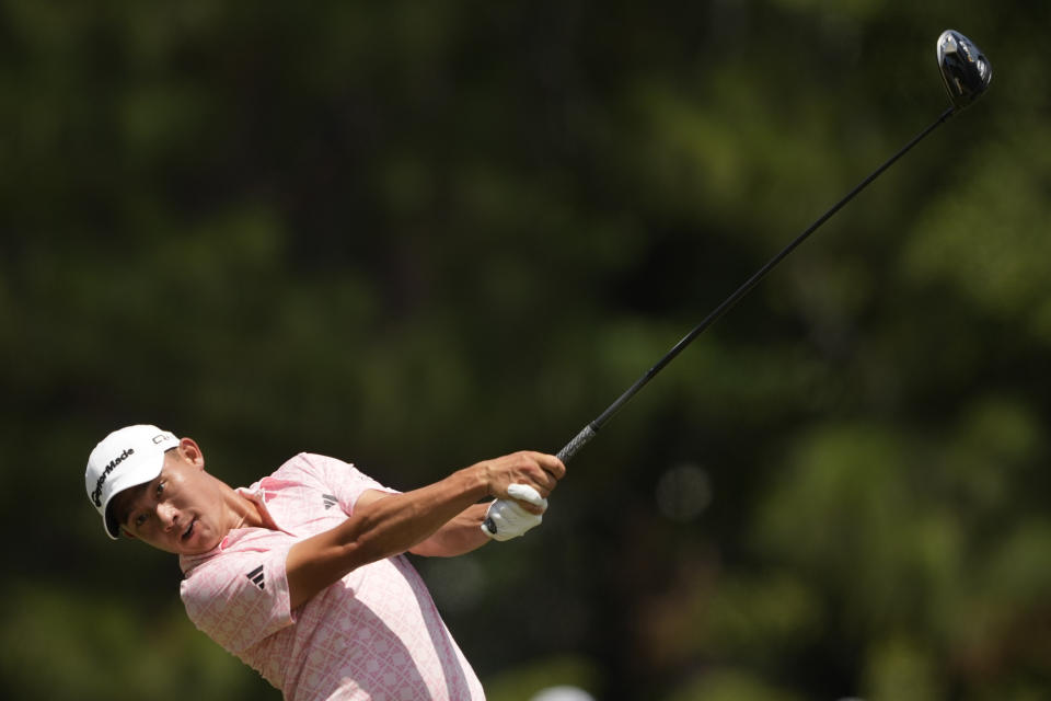 Collin Morikawa watches his tee shot on the eighth hole during the third round of the U.S. Open golf tournament Saturday, June 15, 2024, in Pinehurst, N.C. (AP Photo/Matt York)