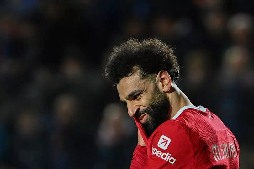 Mohamed Salah reacts during the UEFA Europa League quarter-final second leg football match between Atalanta BC and Liverpool FC at the Atleti Azzurri d'Italia Stadium in Bergamo, on April 18, 2024 -Credit:Photo by ISABELLA BONOTTO/AFP via Getty Images
