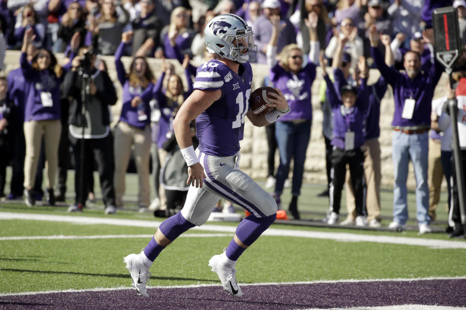 Kansas State quarterback Skylar Thompson (10) runs into the end zone to score a touchdown during the first half of an NCAA college football game against Oklahoma Saturday, Oct. 26, 2019, in Manhattan, Kan. (AP Photo/Charlie Riedel)