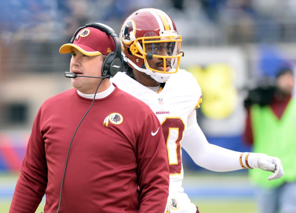 Jay Gruden and Robert Griffin III during a game in 2014.