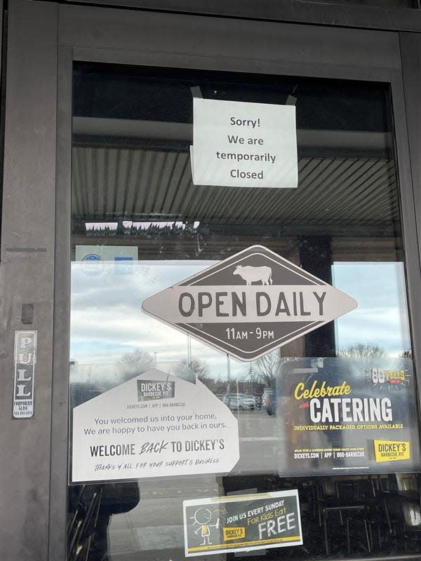 The sign on the front door of Dickey's Barbecue Pit at 3716 Liberty St. states they are temporarily closed.