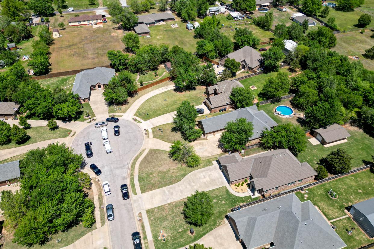 Oklahoma City police investigate in the 2800 block of Mirage Street after 5 were found dead in a home near Yukon in Oklahoma City, on Monday, April 22, 2024.