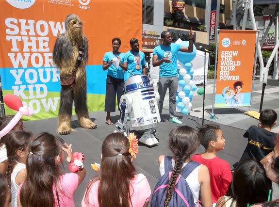 Chewbacca, R2D2, UNICEF USA Southern California Regional Managing Director Amber Hill, Paralympic Judo medalist Dartanyon Crockett, and Emcee Albert Lawrence at the Kid Power Los Angeles event on May 13, 2017.