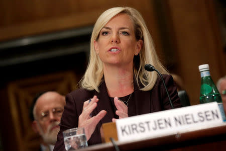 FILE PHOTO: Kirstjen Nielsen testifies to the Senate Homeland Security and Governmental Affairs Committee on her nomination to be secretary of the Department of Homeland Security (DHS) in Washington, U.S. on November 8, 2017. REUTERS/Joshua Roberts/File Photo