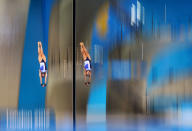 LONDON, ENGLAND - JULY 31: Sarah Barrow and Tonia Couch of Great Britain compete in the Women's Synchronised 10m Platform Diving on Day 4 of the London 2012 Olympic Games at the Aquatics Centre on July 31, 2012 in London, England. (Photo by Al Bello/Getty Images)