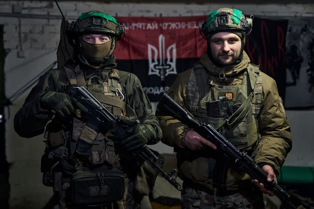 Ukrainian soldiers pose in a shelter in Bakhmut, Donetsk region, Ukraine, Tuesday, Feb. 21, 2023